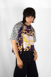 PONCHO DEPORTIVO LEONA MORADO